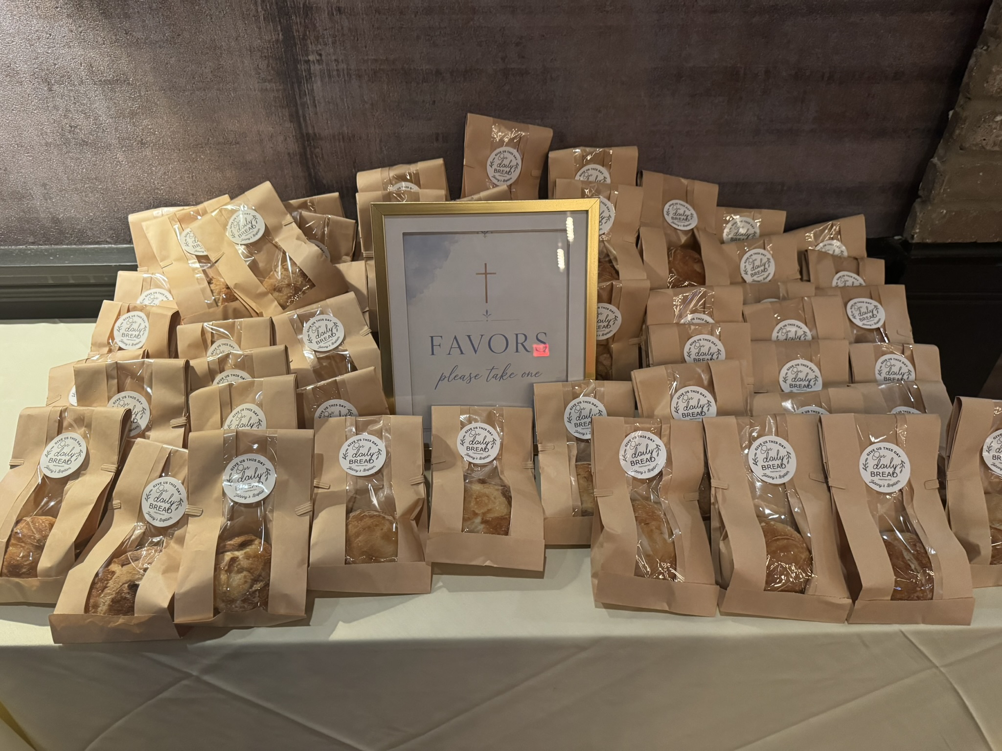 Mini sourdough loaves arranged as baptism favors